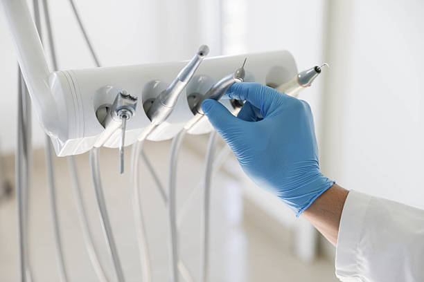 Professional Tooth Extraction technician working in Burlington, KS
